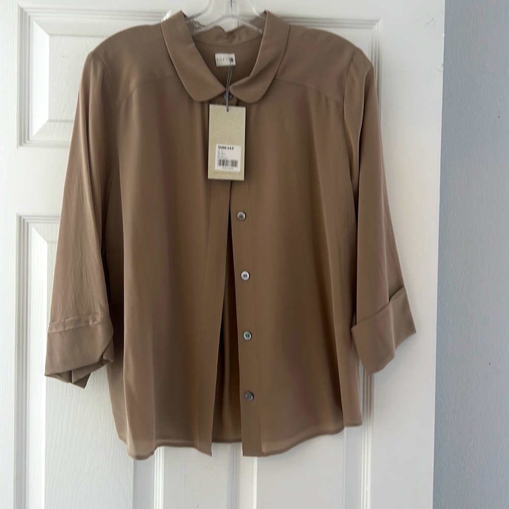 Beautiful taupe silk blouse with detail sleeves and wonderful drape.